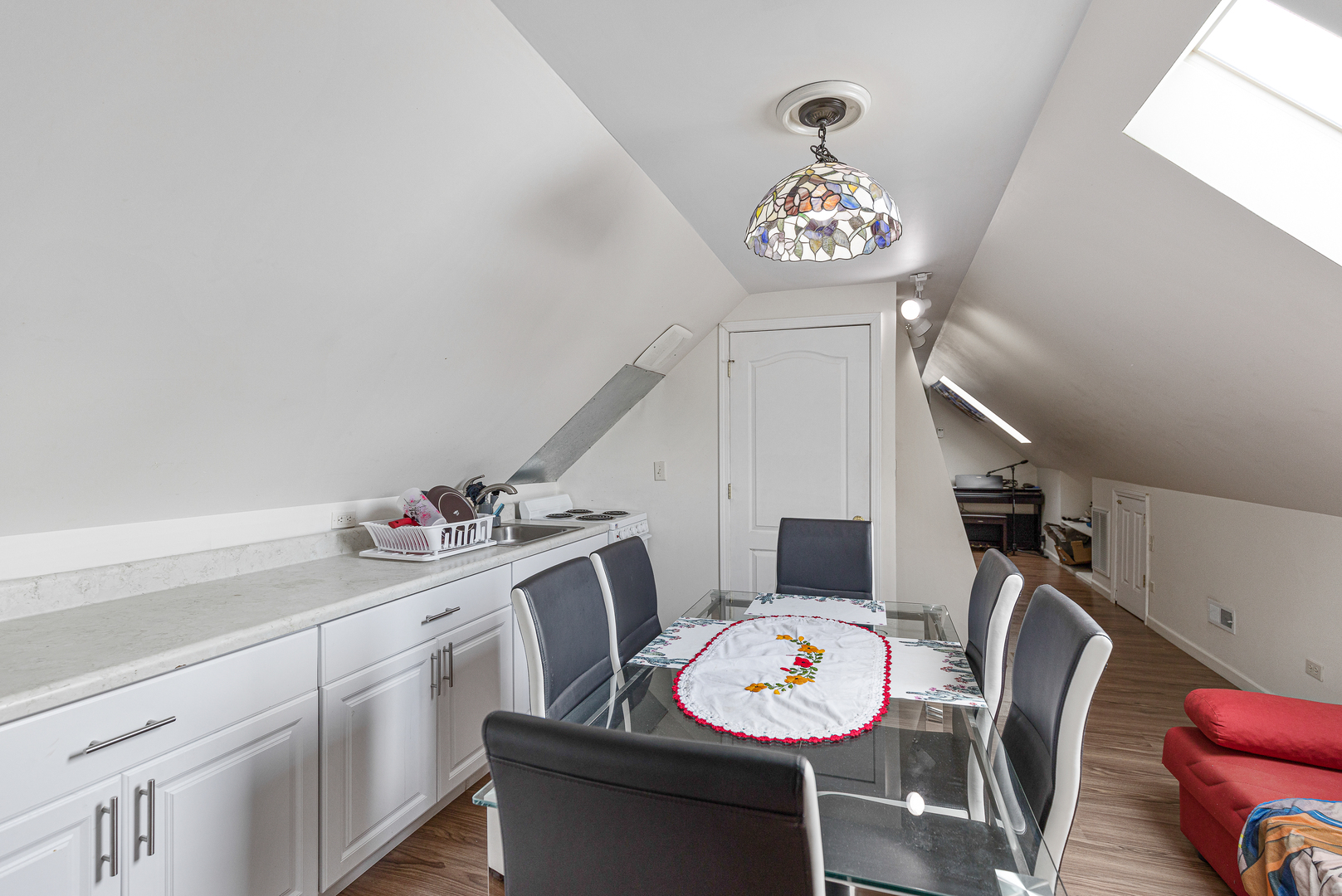 2135 North Menard Avenue, Unit 3 Chicago, IL 60639 - Photo 9 of 12 a view of a dining room with furniture and wooden floor