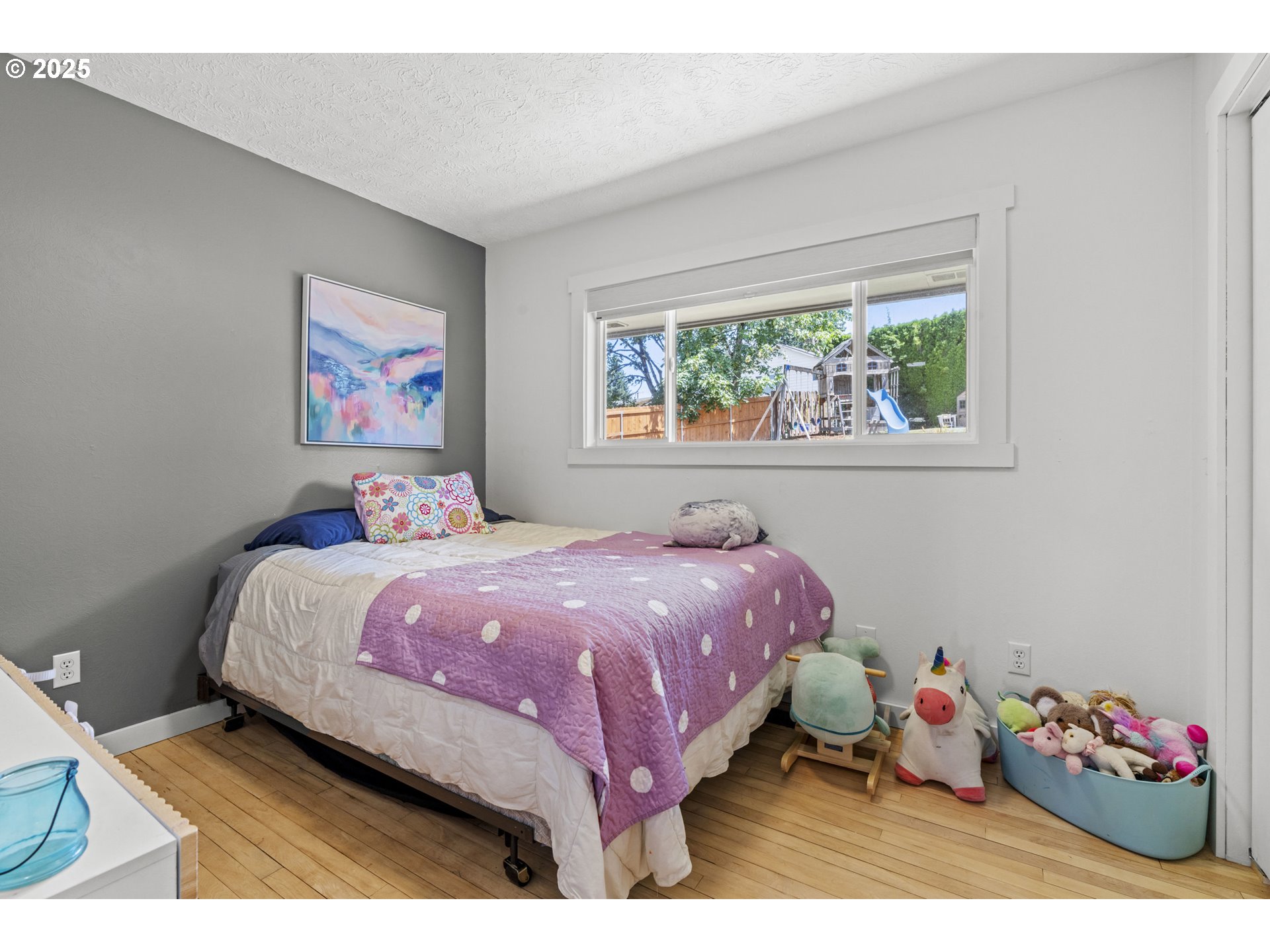 470 South 9th Court Ridgefield, WA 98642 - Photo 23 of 47 a bedroom with a bed and a painting on the wall