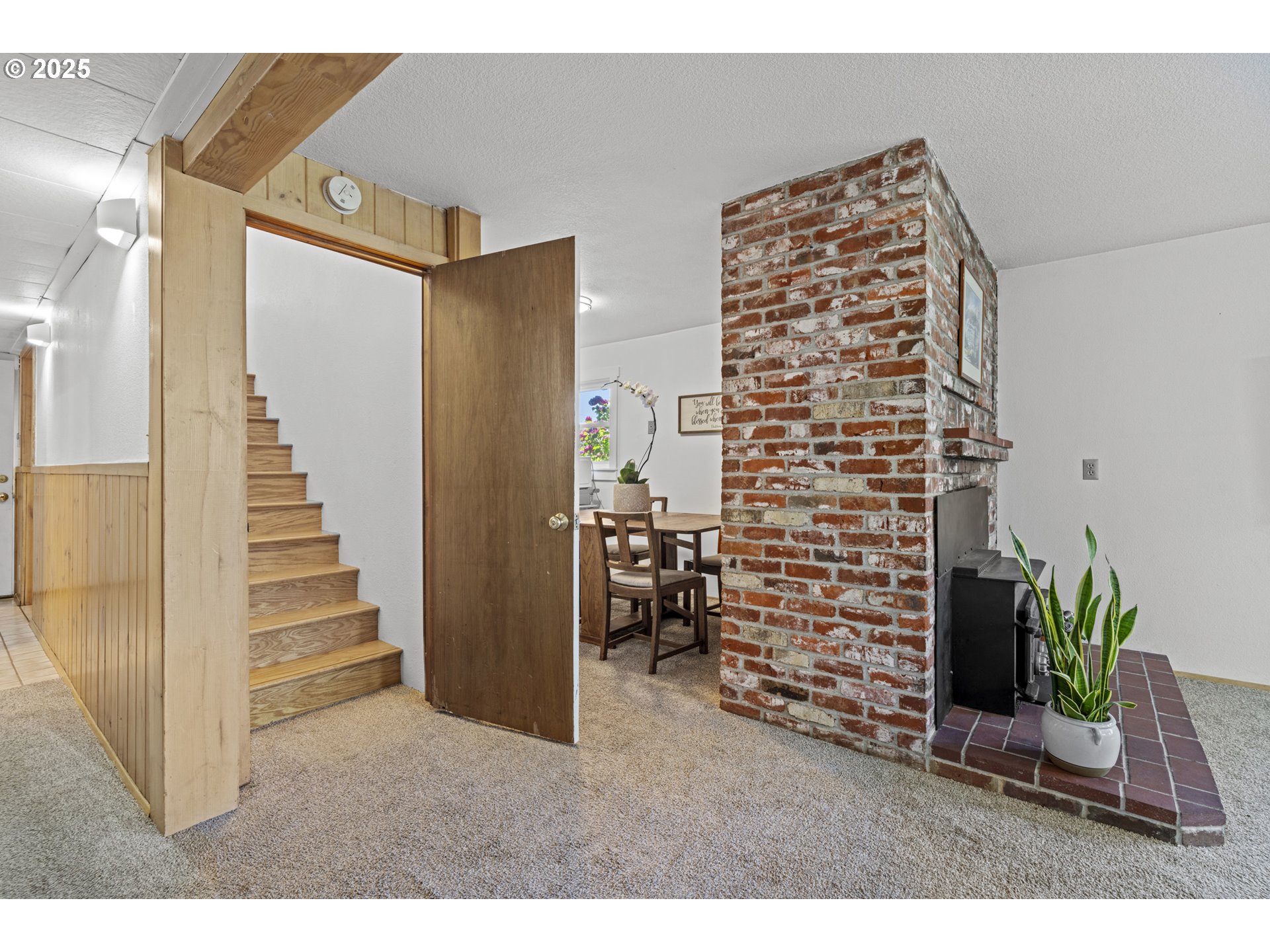 470 South 9th Court Ridgefield, WA 98642 - Photo 26 of 47 a view of livingroom with entryway and stairs