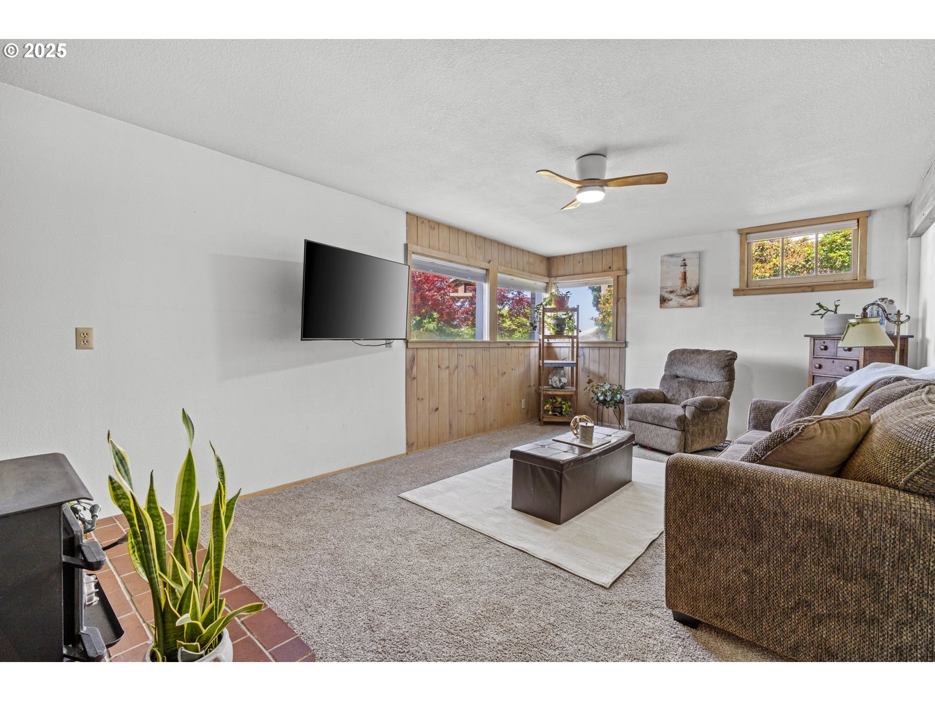 470 South 9th Court Ridgefield, WA 98642 - Photo 27 of 47 a living room with furniture and a flat screen tv