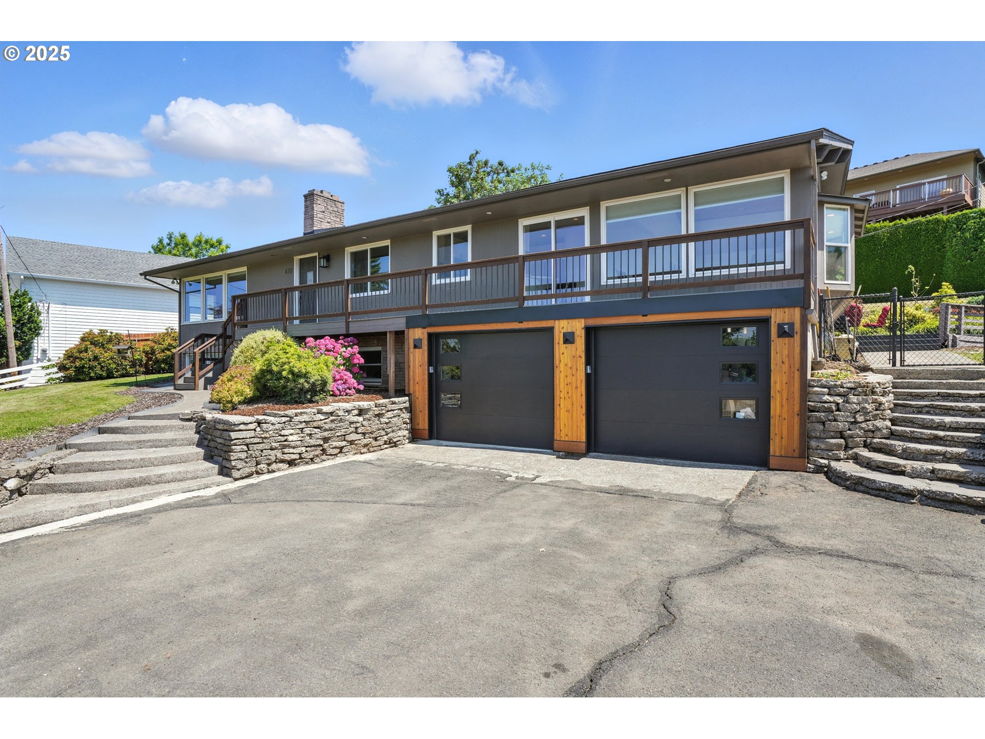470 South 9th Court Ridgefield, WA 98642 - Photo 3 of 47 a front view of a house with a yard