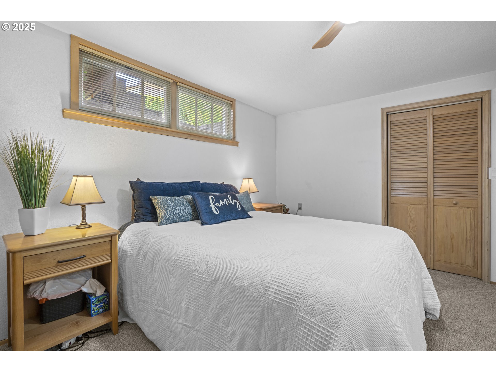 470 South 9th Court Ridgefield, WA 98642 - Photo 33 of 47 a bedroom with a bed and a painting on the wall