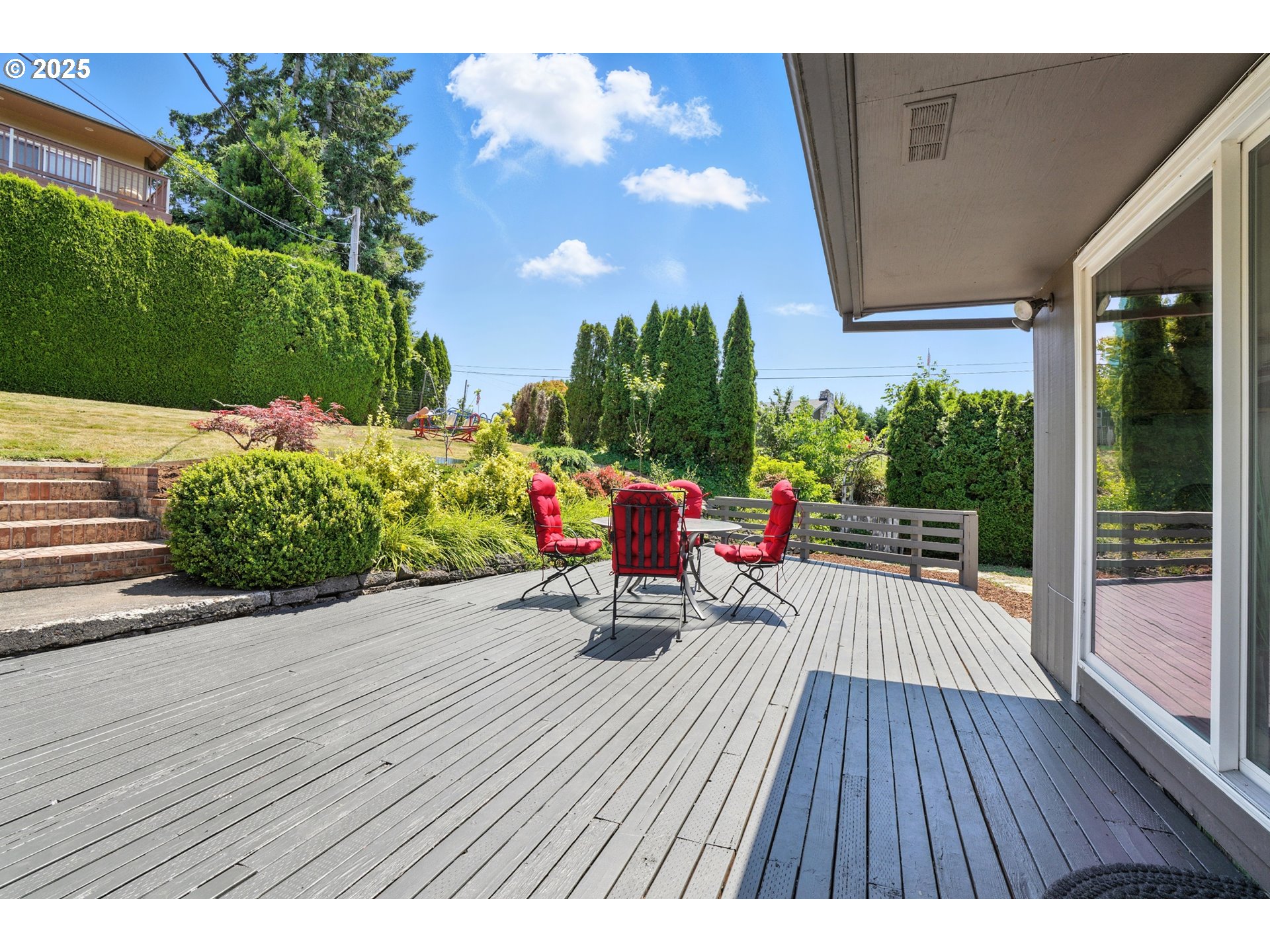 470 South 9th Court Ridgefield, WA 98642 - Photo 37 of 47 a bench is sitting in middle of garden