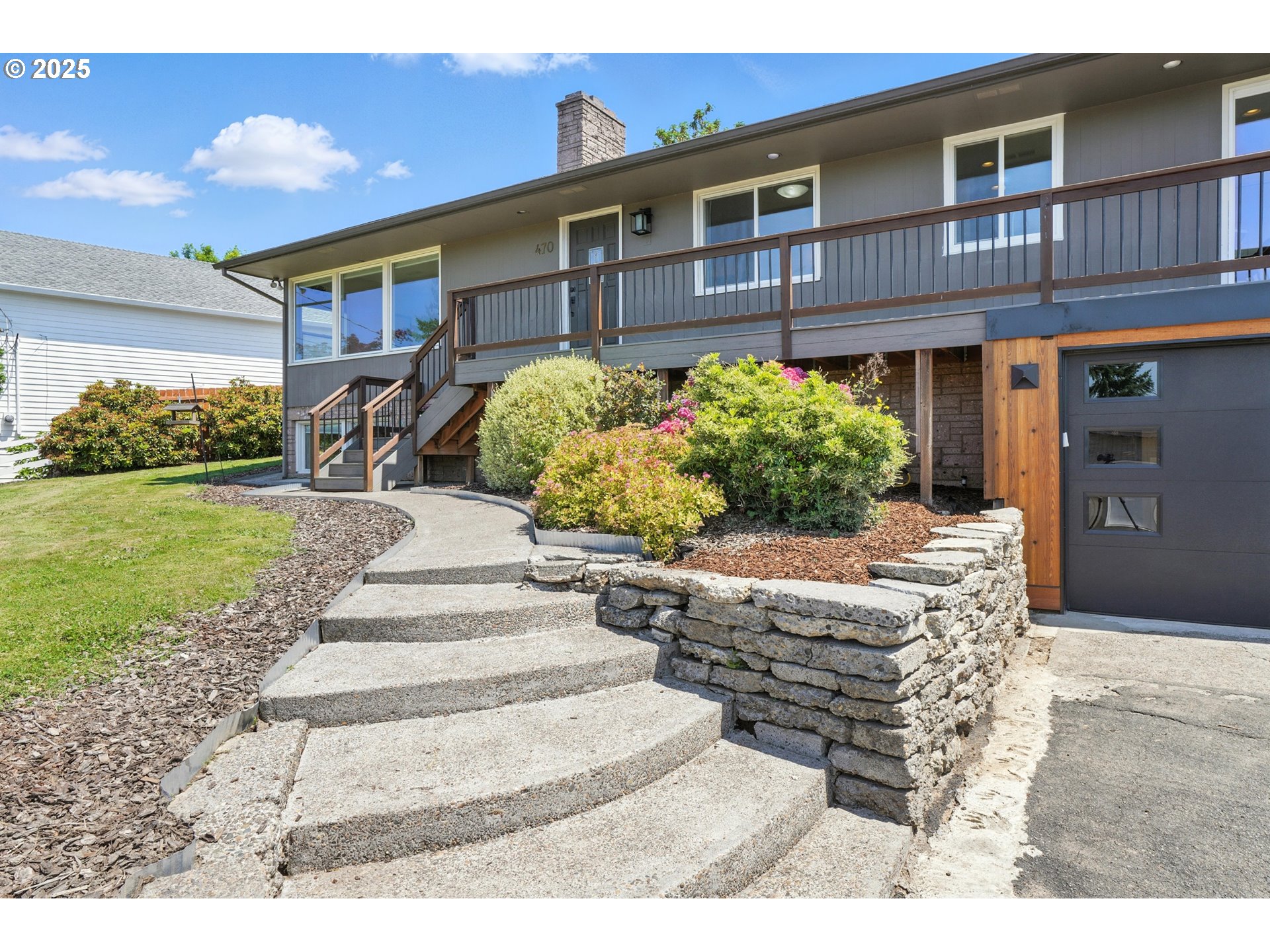 470 South 9th Court Ridgefield, WA 98642 - Photo 4 of 47 a front view of a house with a yard