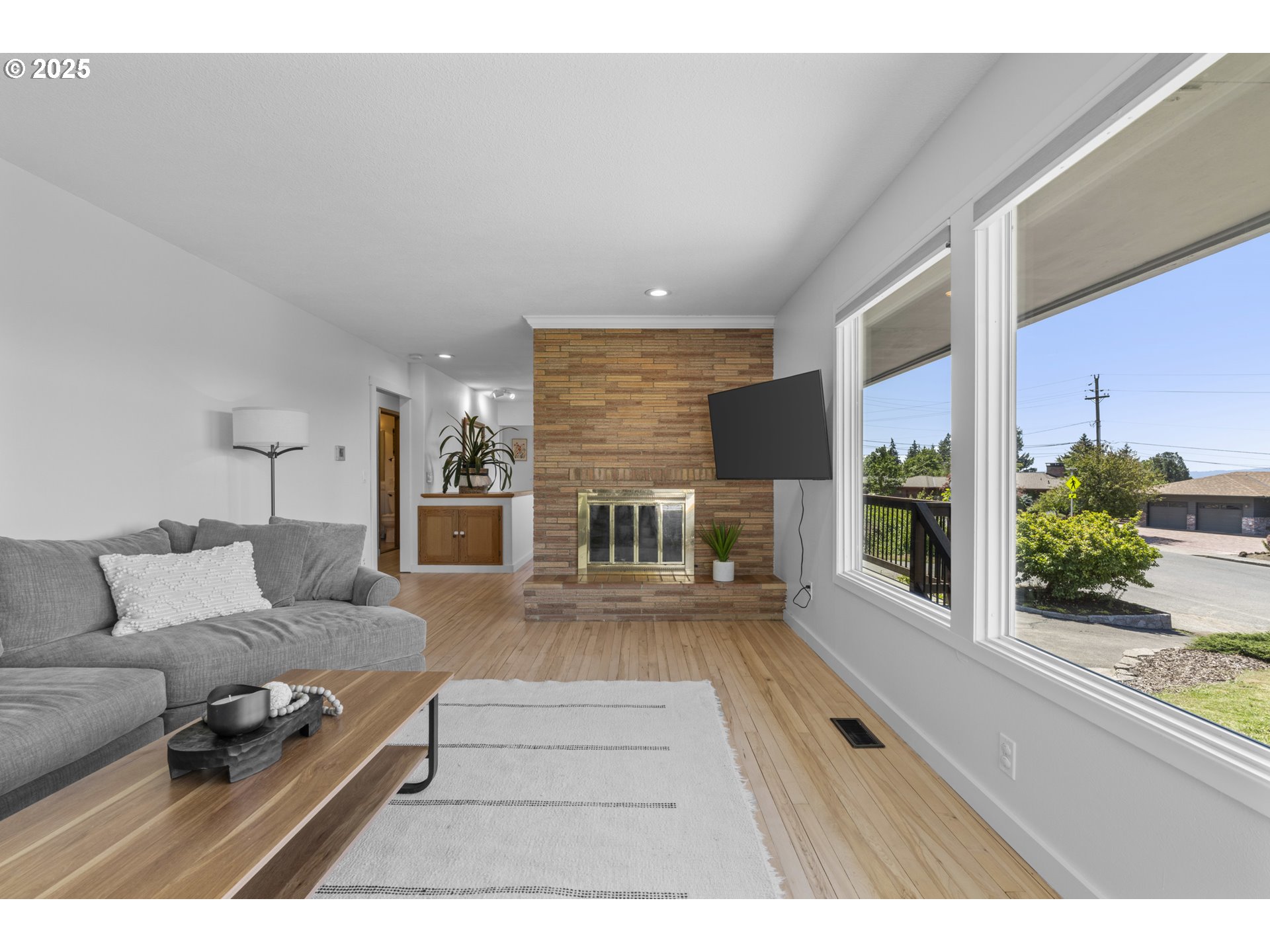 470 South 9th Court Ridgefield, WA 98642 - Photo 7 of 47 a living room with furniture and a large window