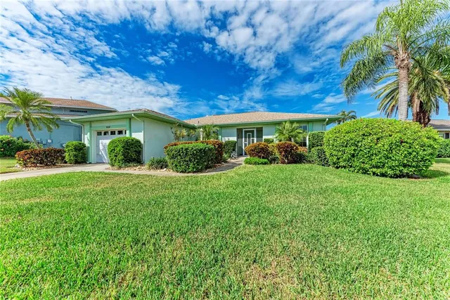 a view of a house with a garden