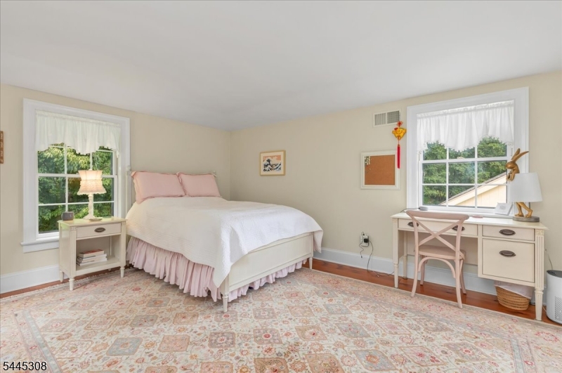 911 Ravine Road Port Murray, NJ 07865 - Photo 20 of 50 a bed room with a bed and a chair