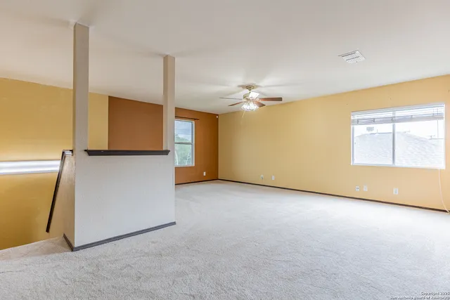 a view of a livingroom with a furniture