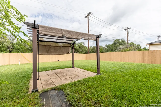 a view of a backyard with a garden