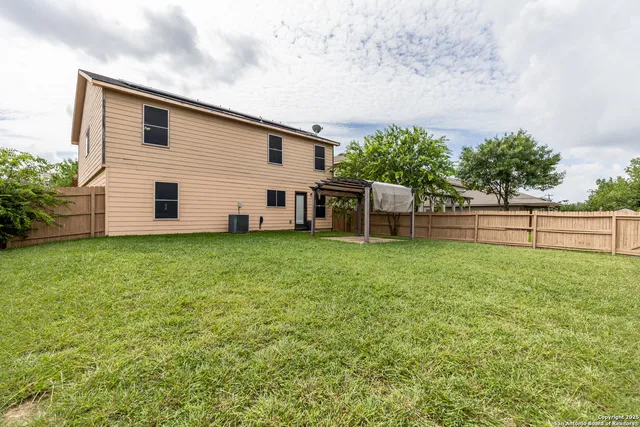 a house view with a garden space