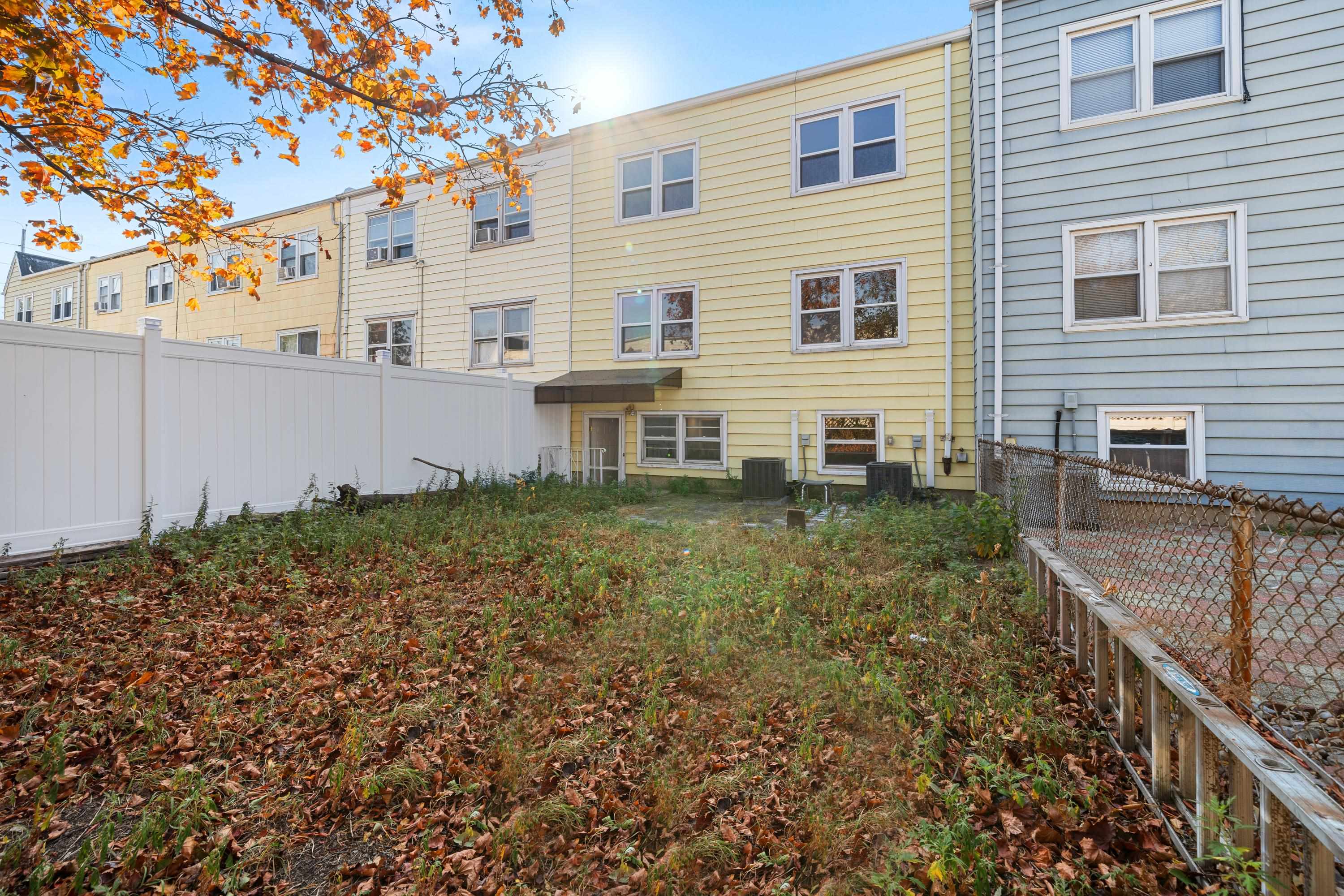 14 Delmar Road Jersey City, NJ 07305 - Photo 23 of 38 a backyard of a house with lots of green space
