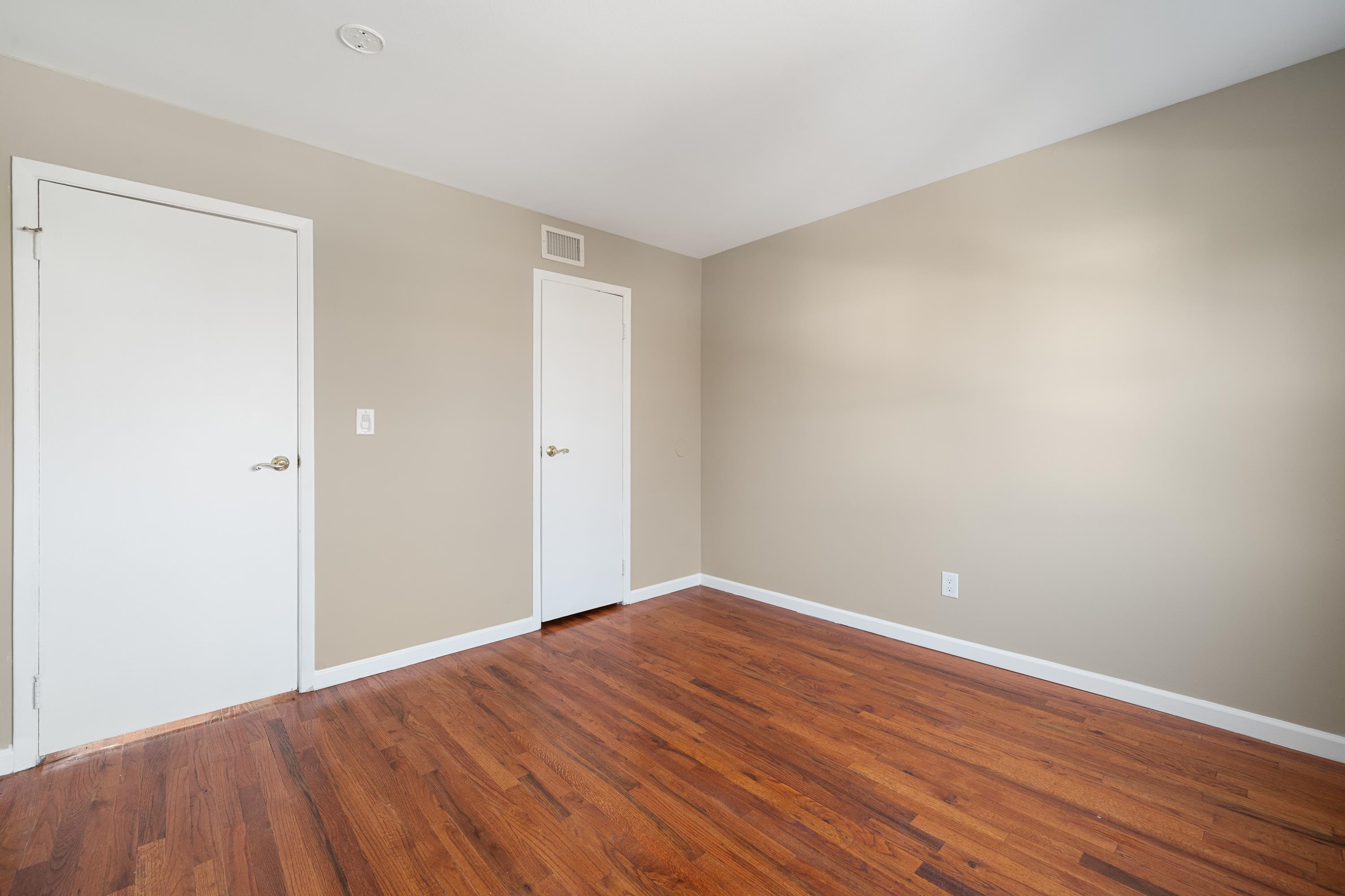 14 Delmar Road Jersey City, NJ 07305 - Photo 33 of 38 a view of room with wooden floor