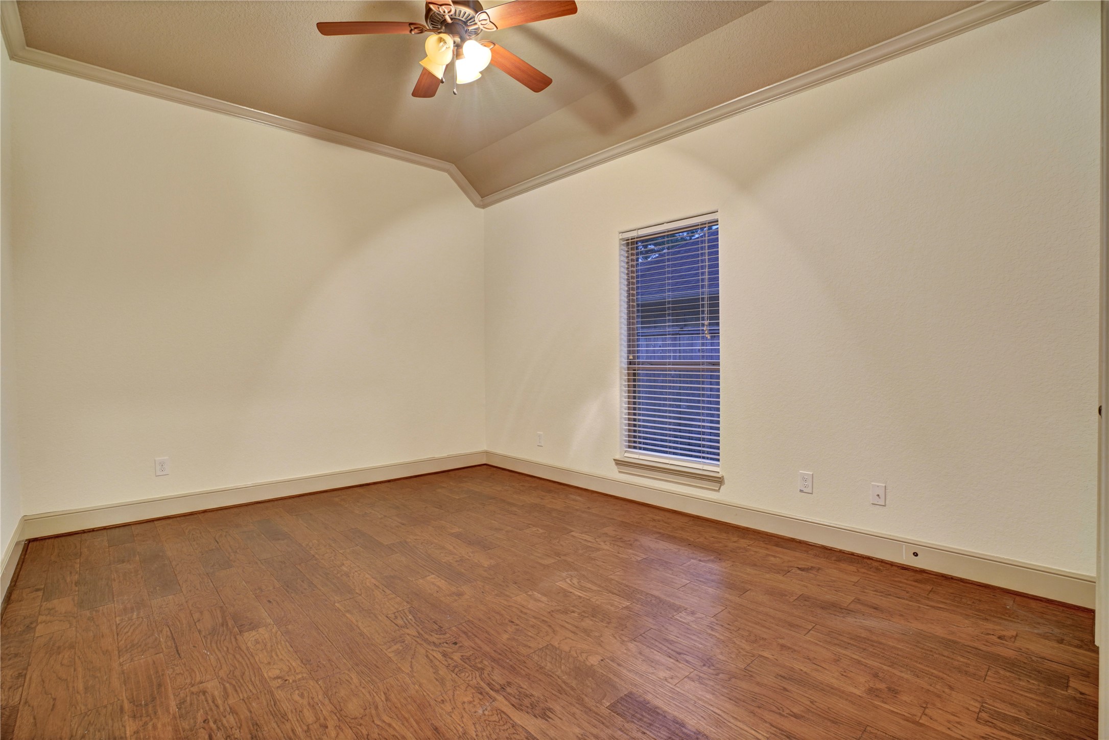 10 Tallgrass Way Spring, TX 77389 - Photo 19 of 23 a view of an empty room with a window