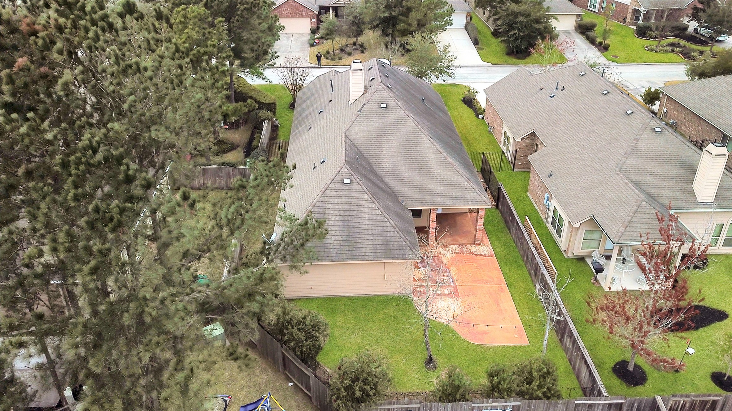 10 Tallgrass Way Spring, TX 77389 - Photo 23 of 23 an aerial view of a house with a yard and trees