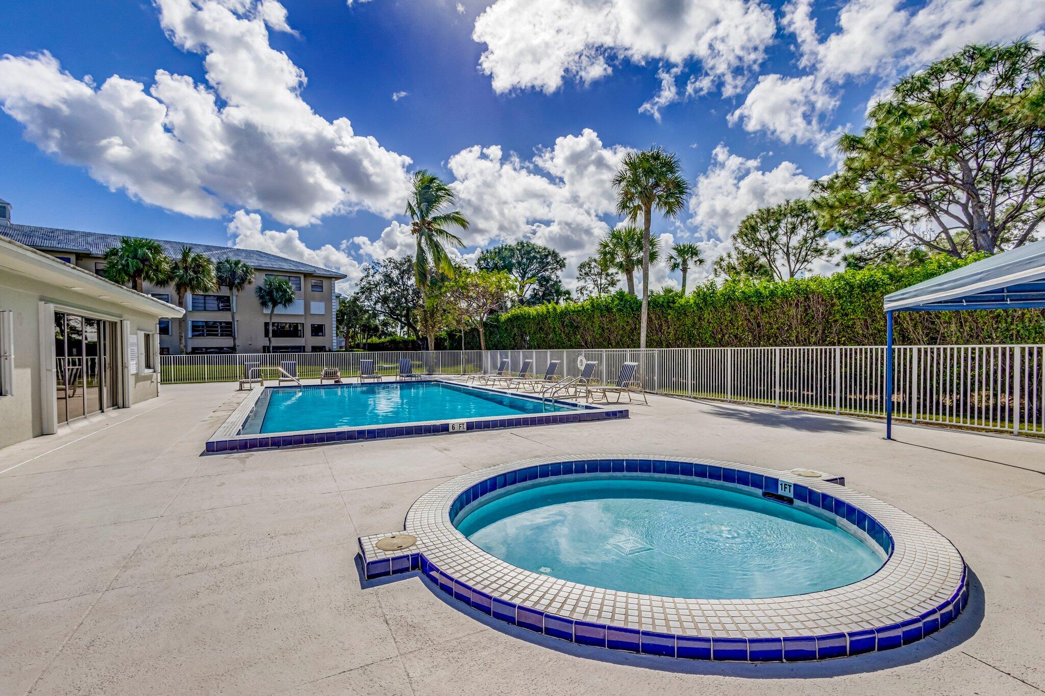 6025 Balboa Circle, Unit 303 Boca Raton, FL 33433 - Photo 23 of 23 a view of a swimming pool with a patio