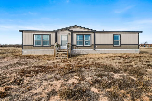a front view of house with yard
