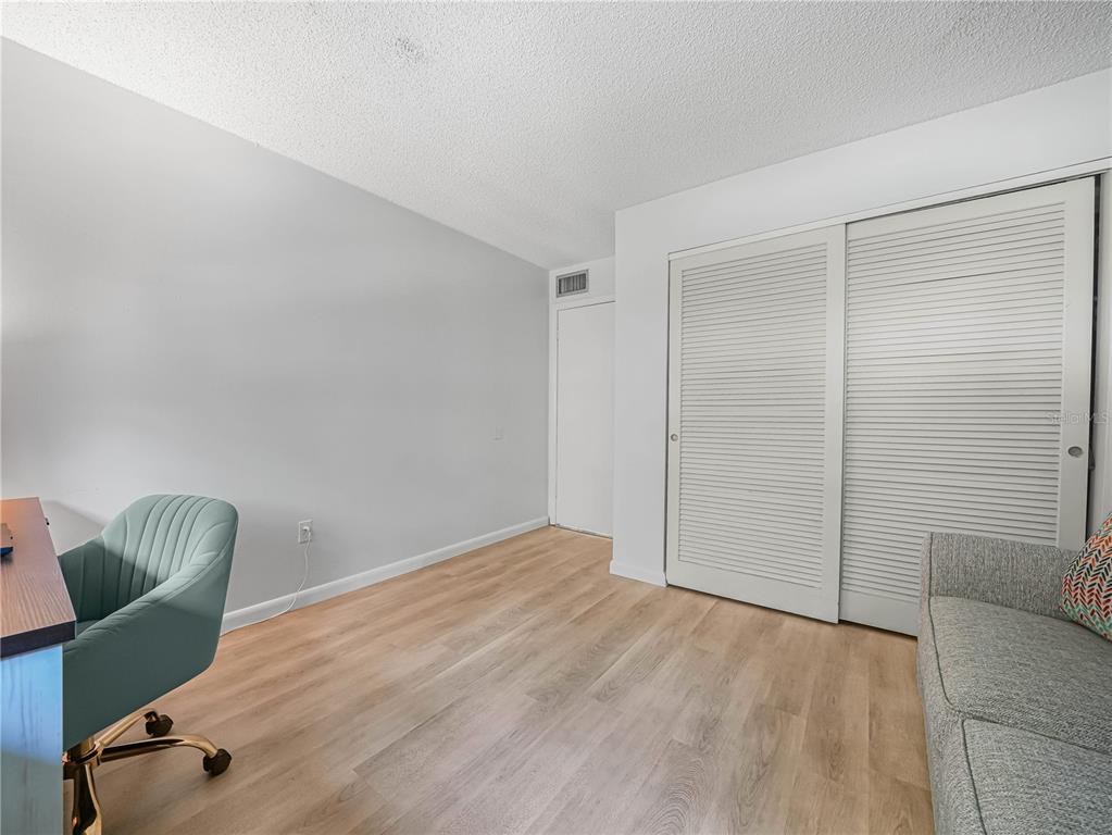 525 South Conway Road, Unit 100 Orlando, FL 32807 - Photo 17 of 23 a view of livingroom with furniture and a ceiling fan