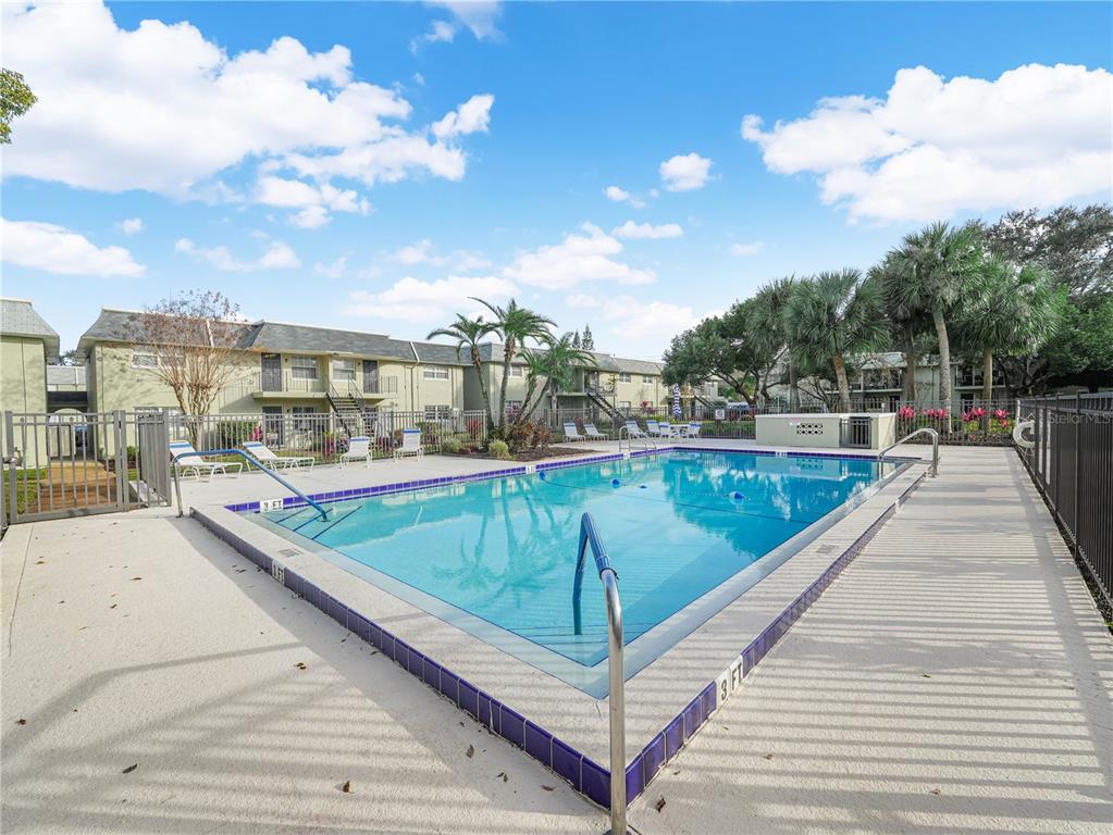 525 South Conway Road, Unit 100 Orlando, FL 32807 - Photo 21 of 23 a view of swimming pool with a balcony