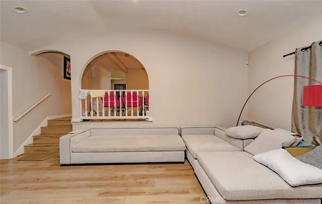 a living room with furniture and a rug