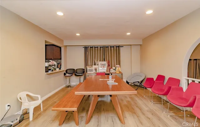 a very nice looking room with a couch and a flat screen tv