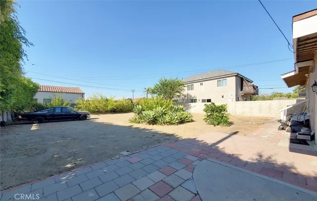 a view of a back yard of the house