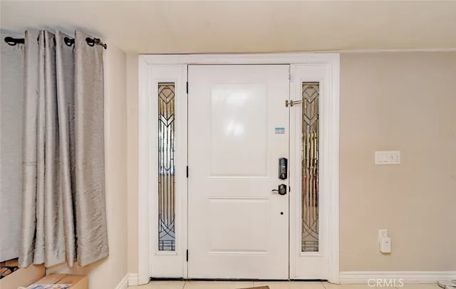 a bathroom with a shower and a mirror