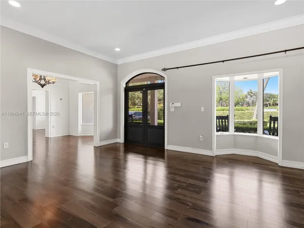 a view of dining room with furniture and wooden floor