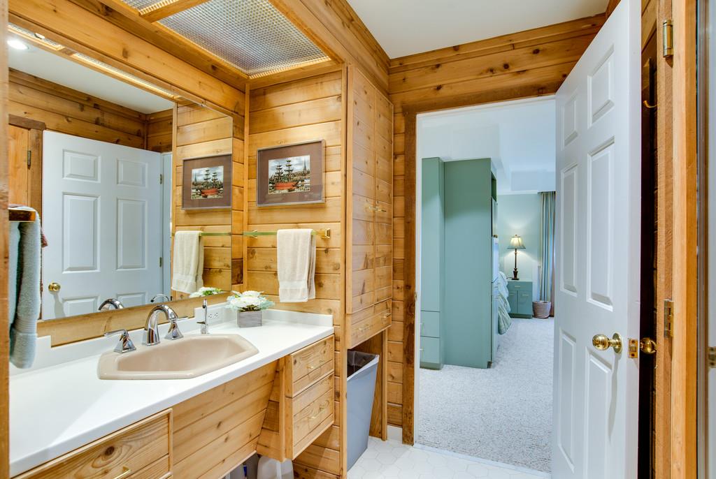 721 Tri Cities Farm Road Winchester, TN 37398 - Photo 18 of 30 Custom master bathroom with Western Cedar walls and heated floors.