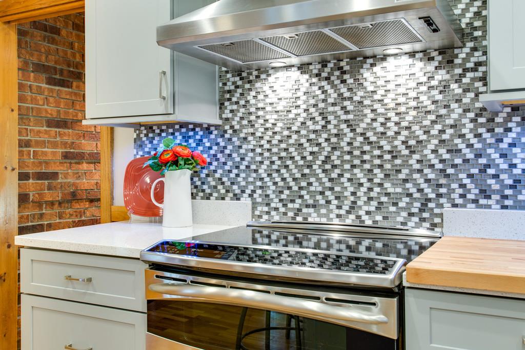 721 Tri Cities Farm Road Winchester, TN 37398 - Photo 10 of 30 Here you see the stainless steele double oven with a true vented Broan Elite hood
