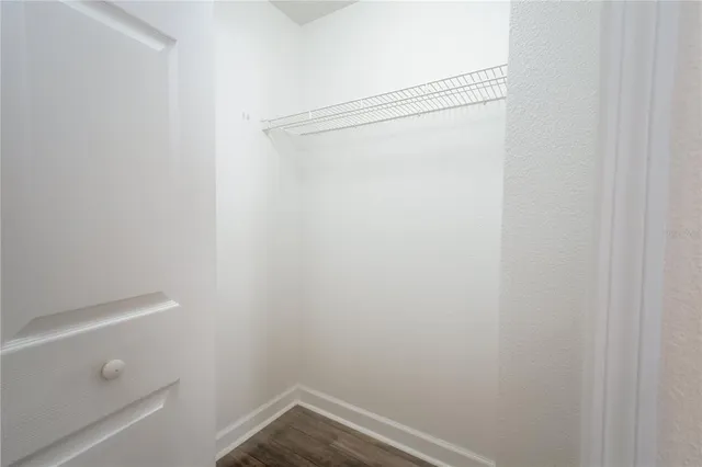 a view of small space with racks on the wall