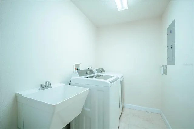 a white sink sitting next to a white sink