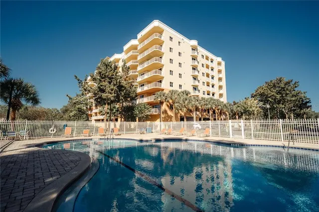 a view of swimming pool with outdoor space and seating area