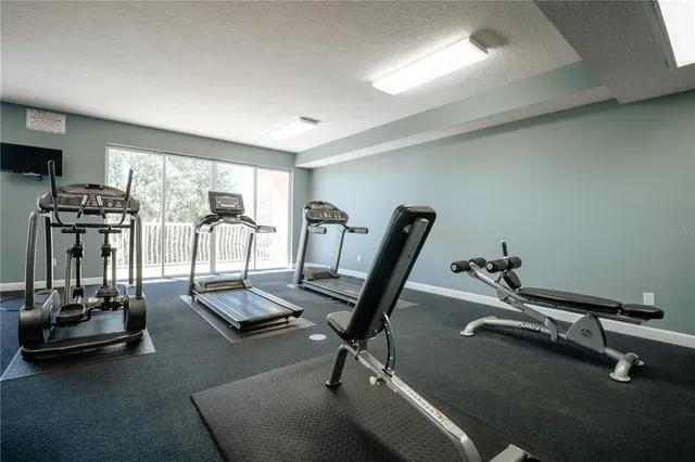 a view of a room with gym equipment