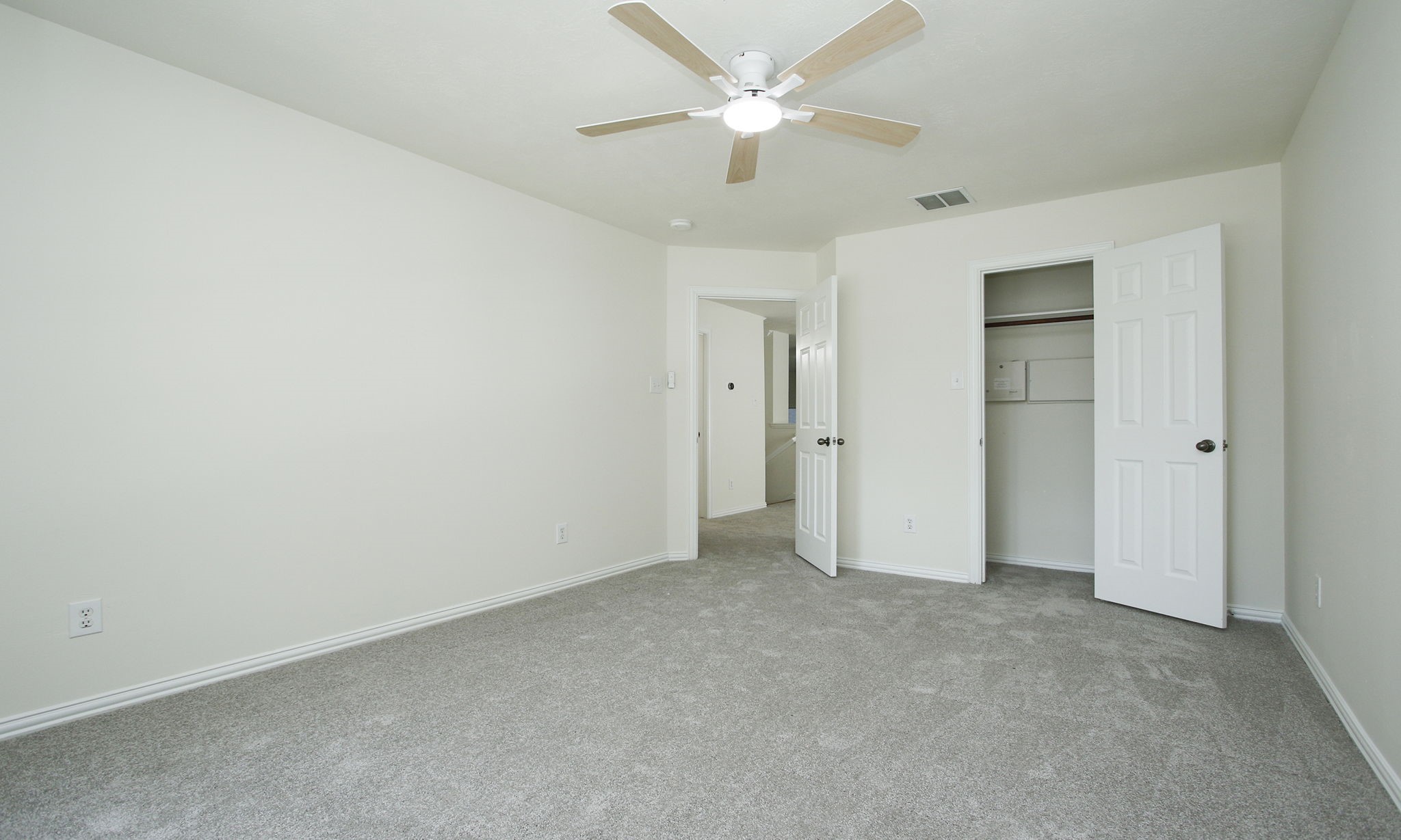 1210 Berwick Manor Court Spring, TX 77379 - Photo 40 of 50 an empty room with a ceiling fan and a fan