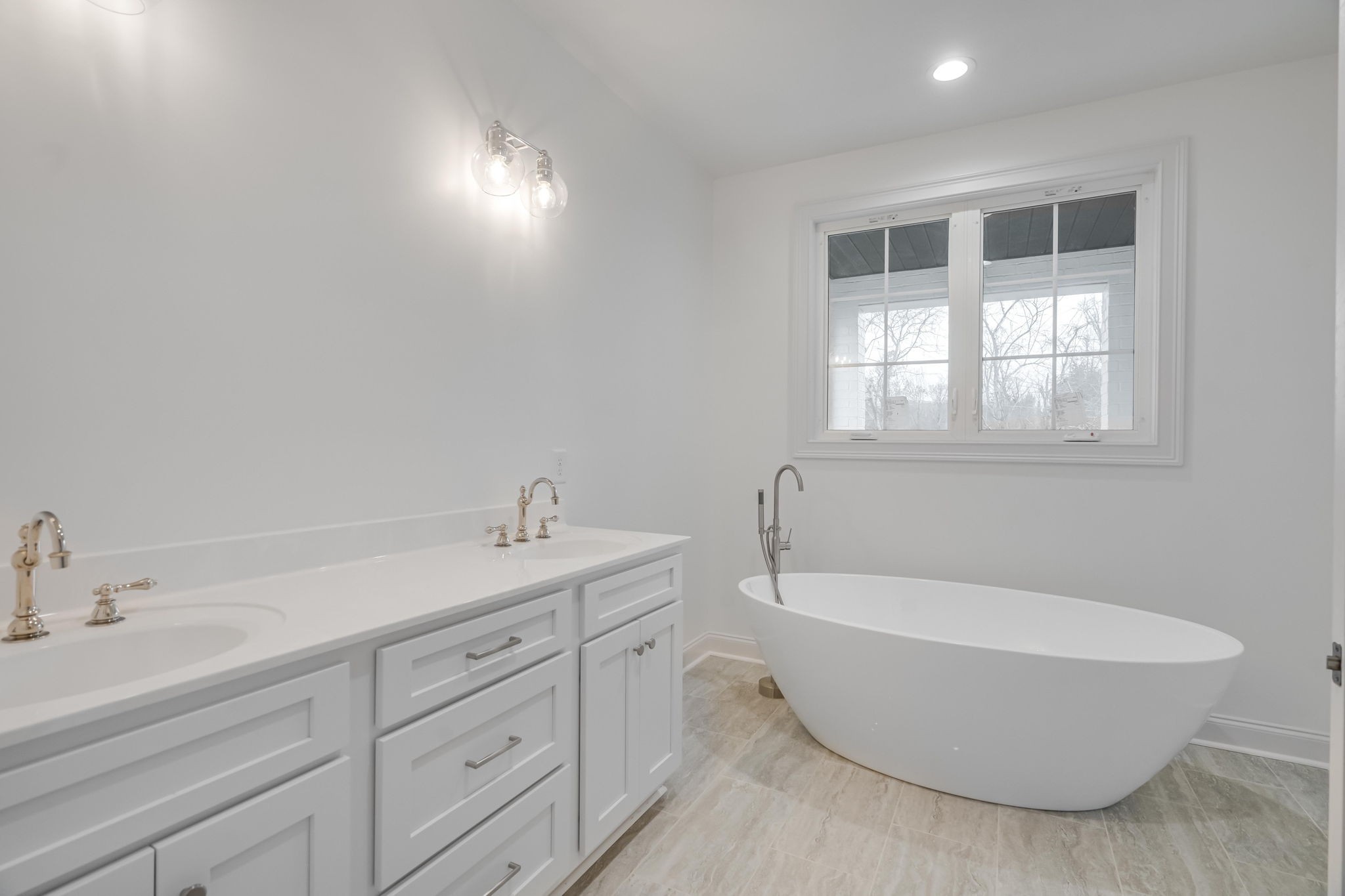 2235 Alvin Head Road Springfield, TN 37172 - Photo 18 of 31 a bathroom with a tub sink and mirror