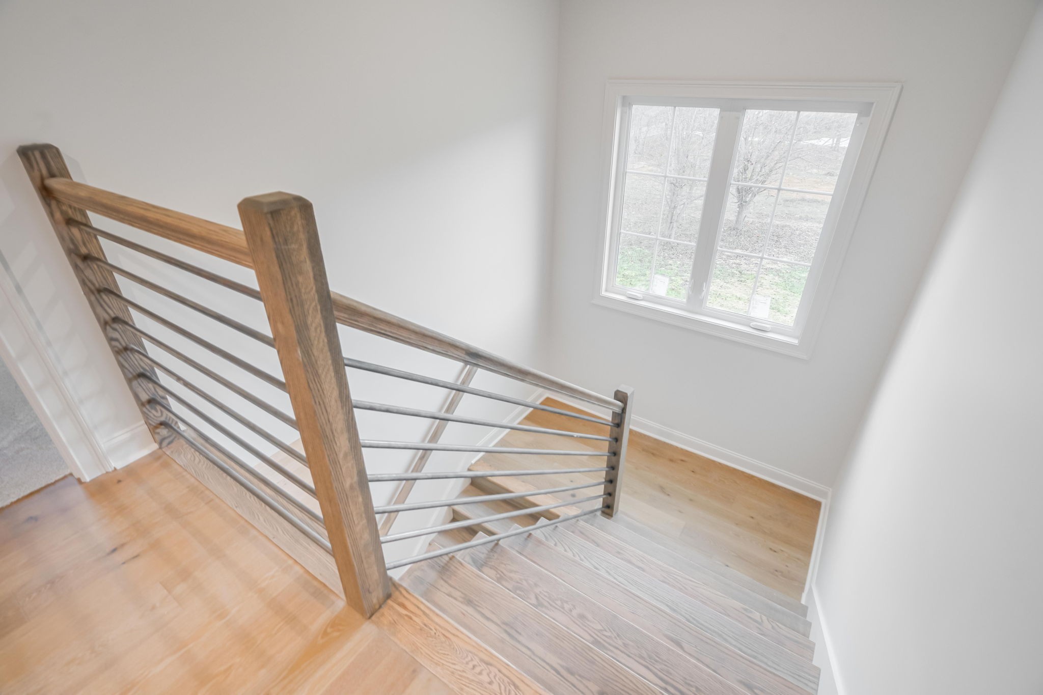 2235 Alvin Head Road Springfield, TN 37172 - Photo 20 of 31 a view of entryway with wooden floor and stairs