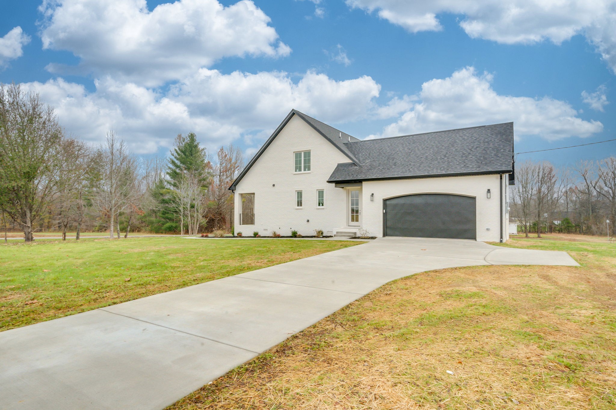2235 Alvin Head Road Springfield, TN 37172 - Photo 29 of 31 a front view of a house with a garden and yard