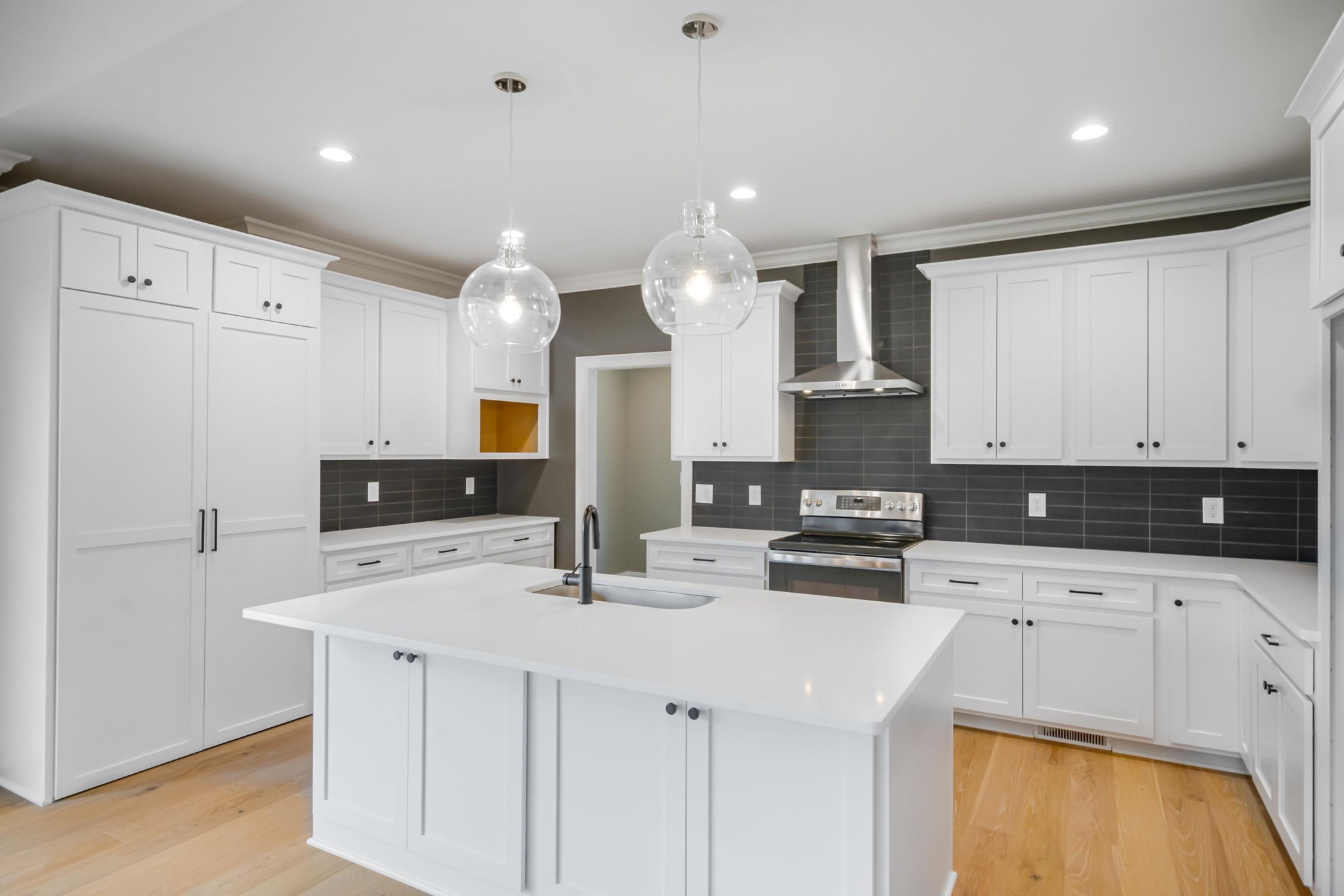 2235 Alvin Head Road Springfield, TN 37172 - Photo 9 of 31 a kitchen with a sink a stove and cabinets