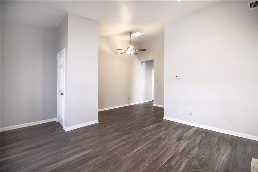 2529 Rio Grande Street, Unit 93 Austin, TX 78705 - Photo 7 of 19 a view of a room with wooden floor