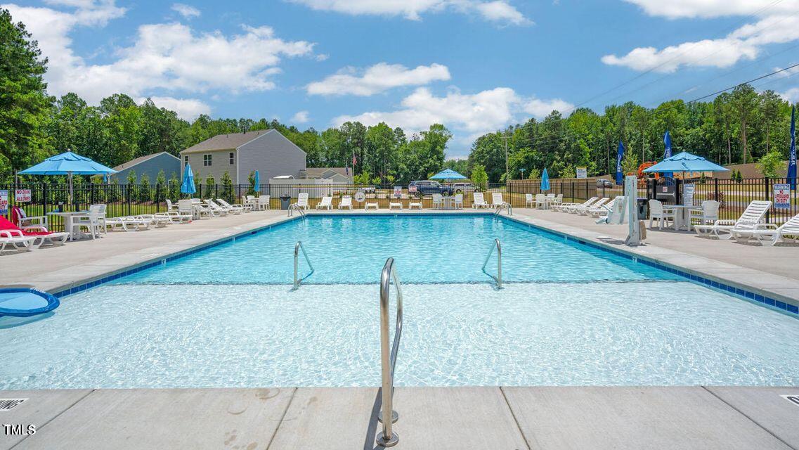 1220 Pavo Path Wendell, NC 27591 - Photo 18 of 26 swimming pool view with a seating space