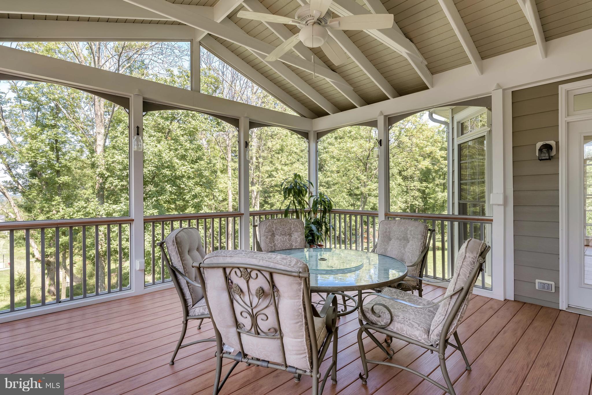 42724 Ridgeway Drive Broadlands, VA 20148 - Photo 11 of 30 a view of a dining room with furniture window and wooden floor
