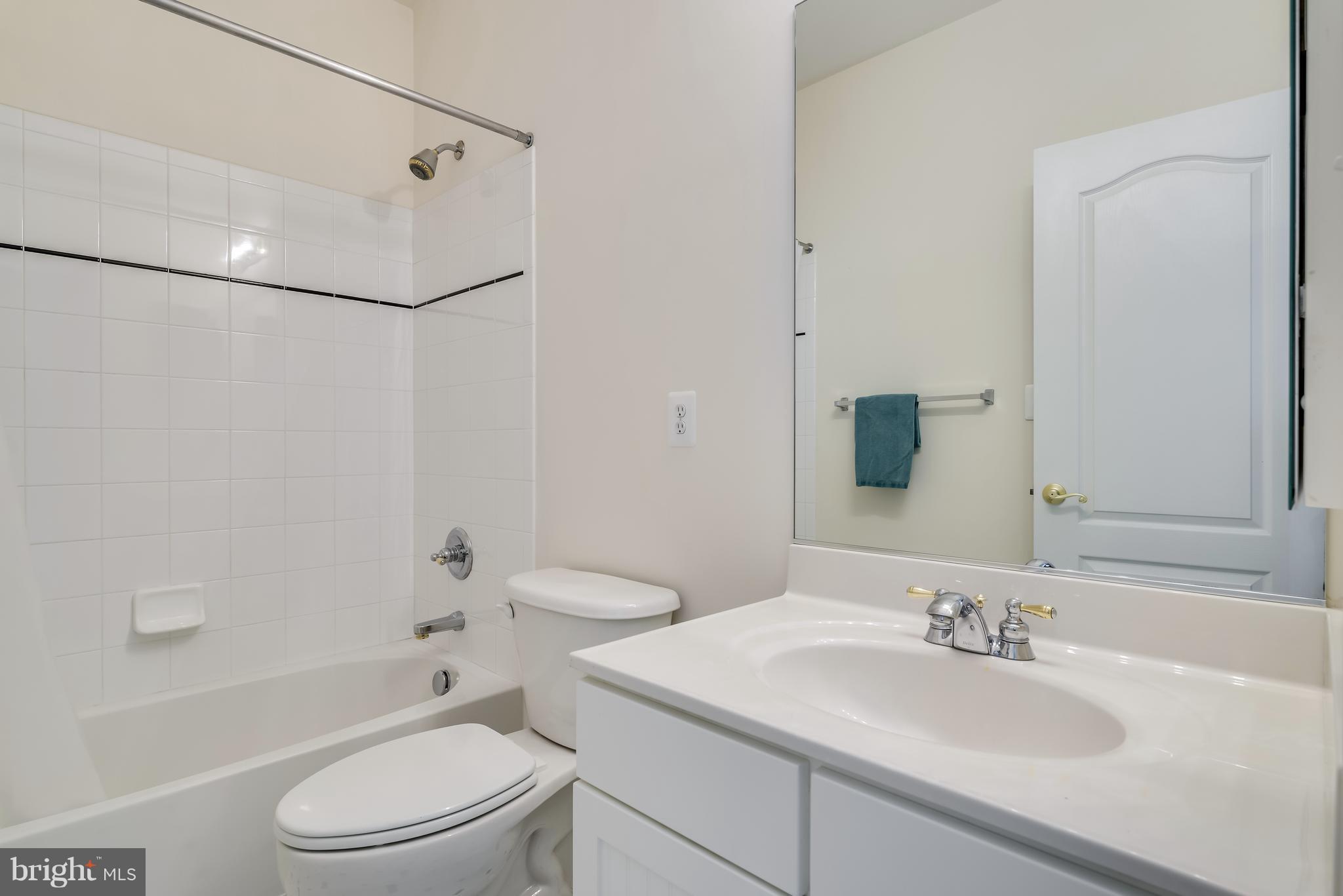 42724 Ridgeway Drive Broadlands, VA 20148 - Photo 22 of 30 a bathroom with a sink a toilet and shower
