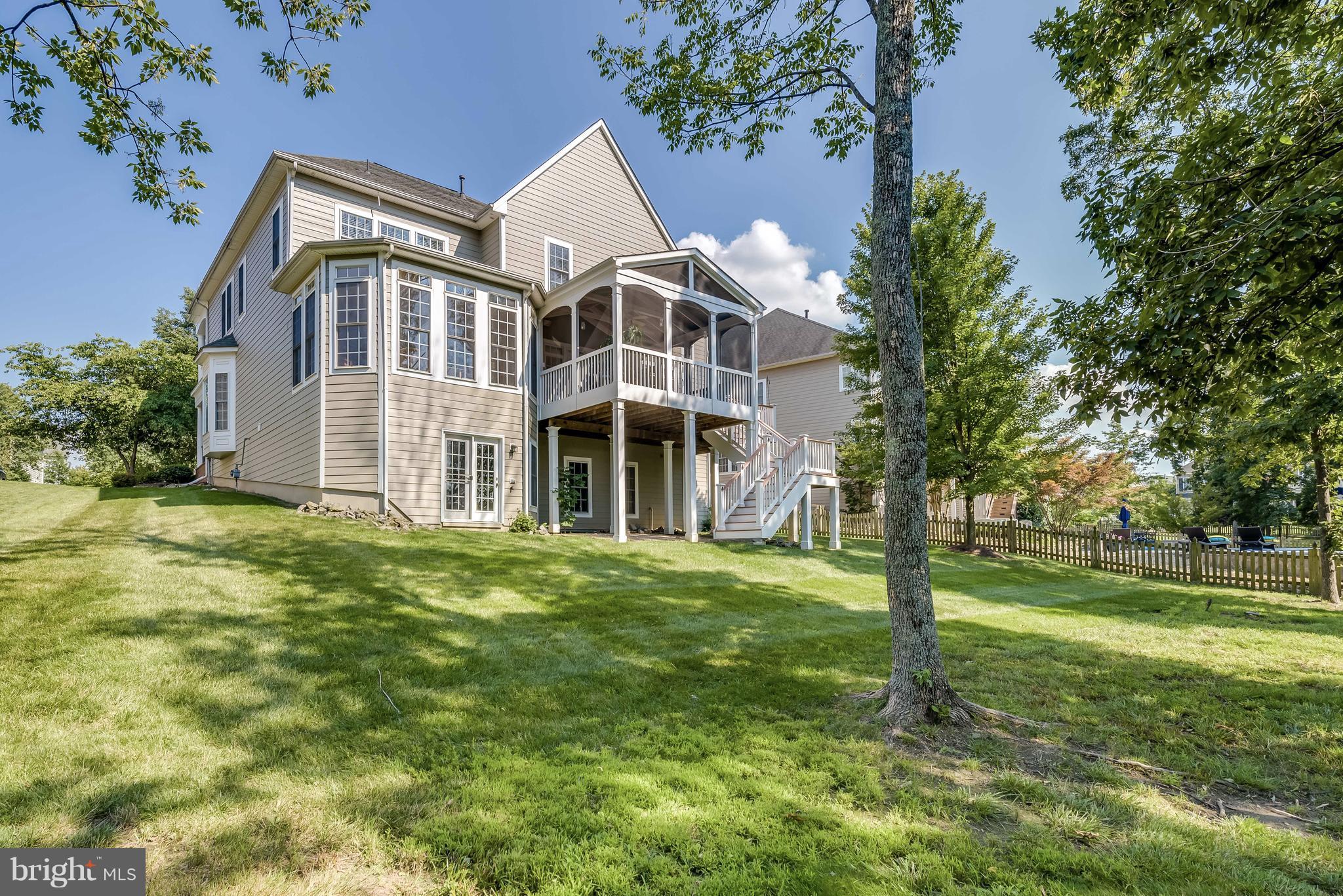 42724 Ridgeway Drive Broadlands, VA 20148 - Photo 28 of 30 a front view of a house with a yard