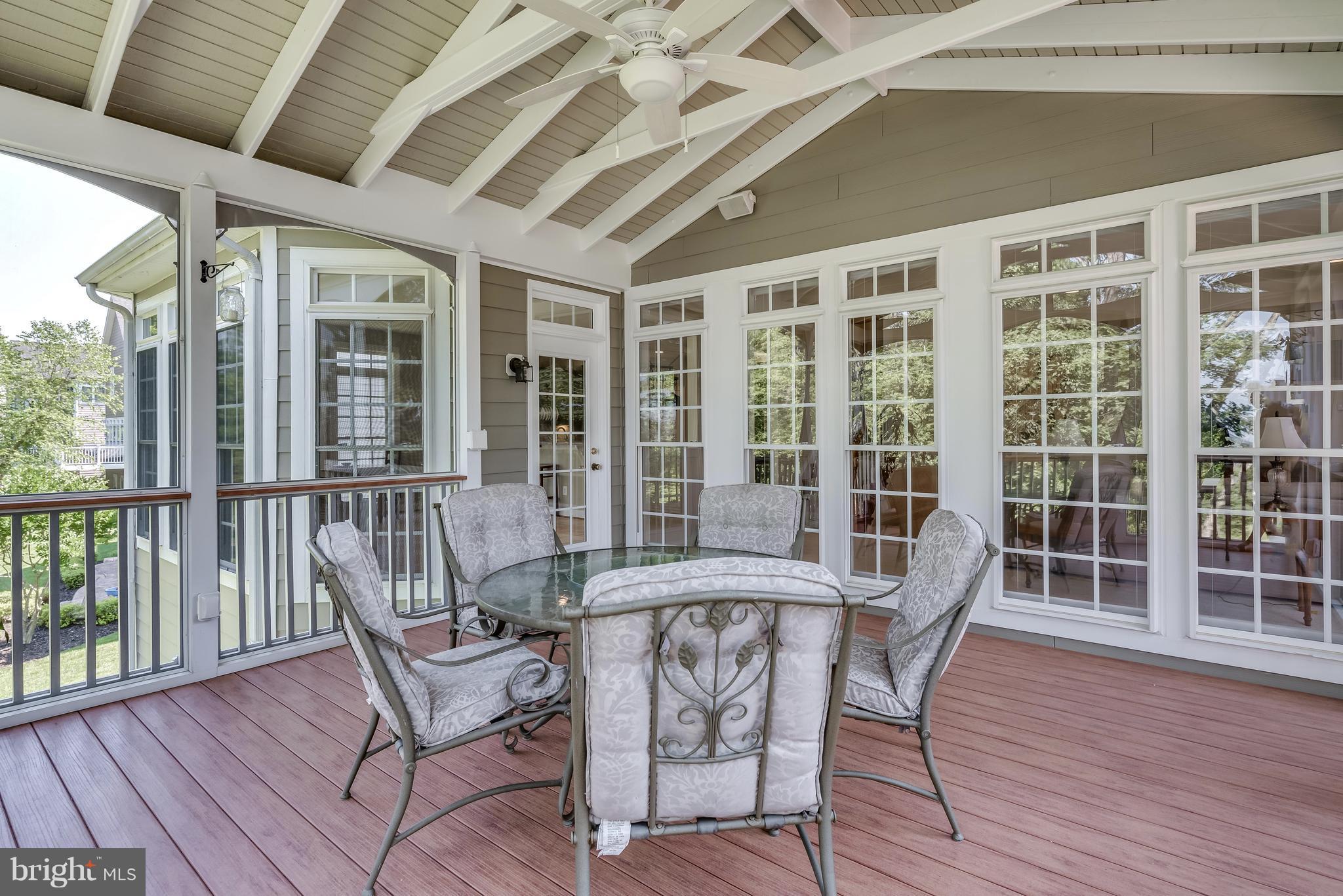 42724 Ridgeway Drive Broadlands, VA 20148 - Photo 10 of 30 a view of a balcony with table and chairs