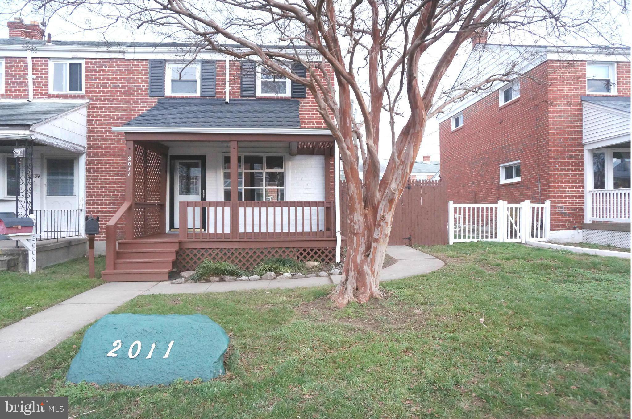 2011 Ormand Road Baltimore, MD 21222 - Photo 25 of 28 a view of a house with a yard