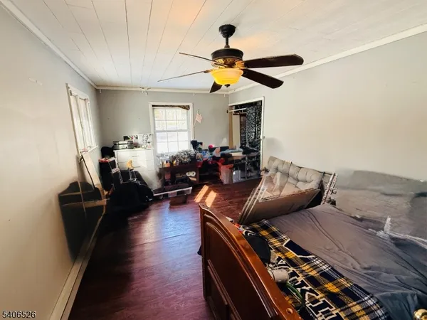 a living room with furniture windows and a fireplace