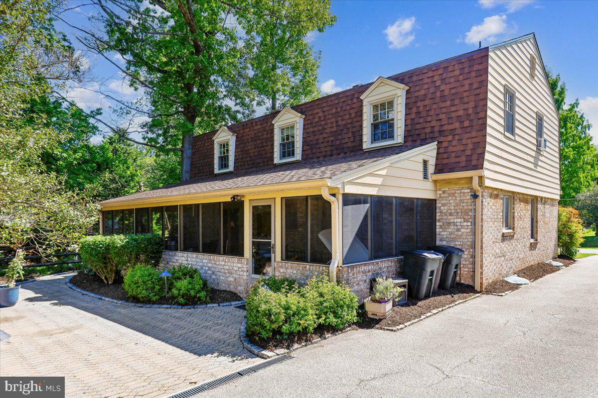 7918 Ruxway Road Towson, MD 21204 - Photo 2 of 36 front view of a house with a small yard