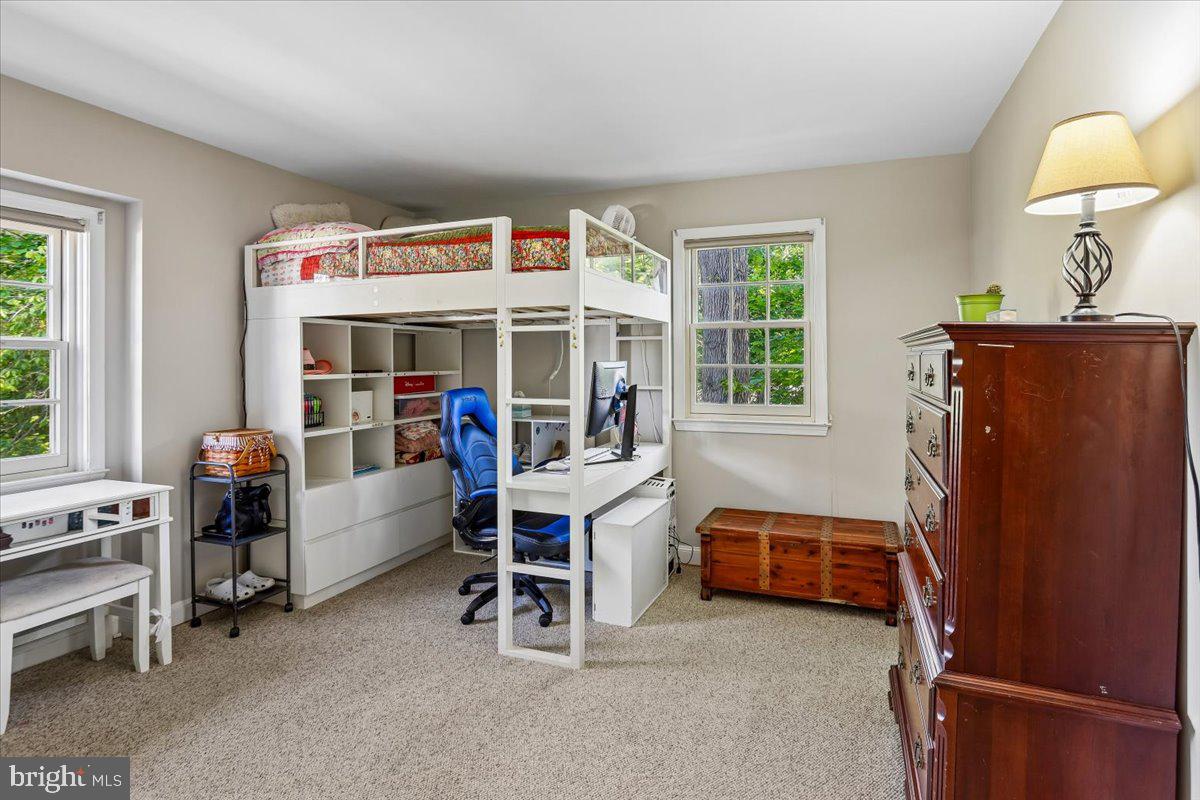 7918 Ruxway Road Towson, MD 21204 - Photo 23 of 36 a bedroom with furniture and a window