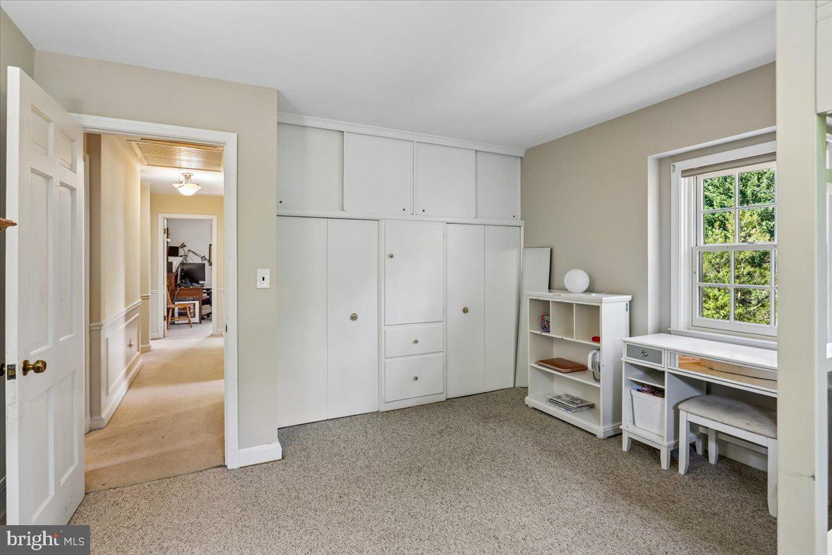 7918 Ruxway Road Towson, MD 21204 - Photo 24 of 36 a view of room with cabinet and windows