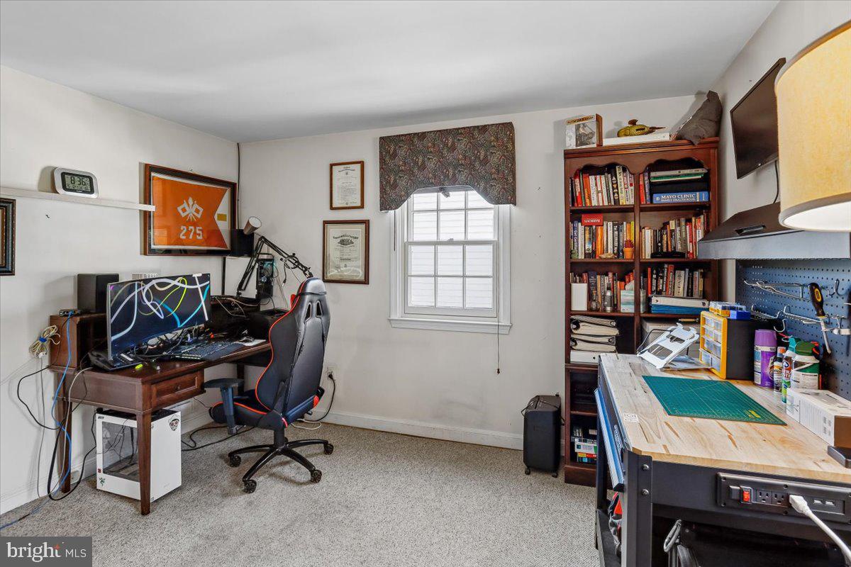 7918 Ruxway Road Towson, MD 21204 - Photo 27 of 36 a view of a workspace with furniture and a window